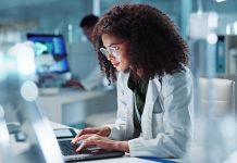 Woman. laptop and lab for research science