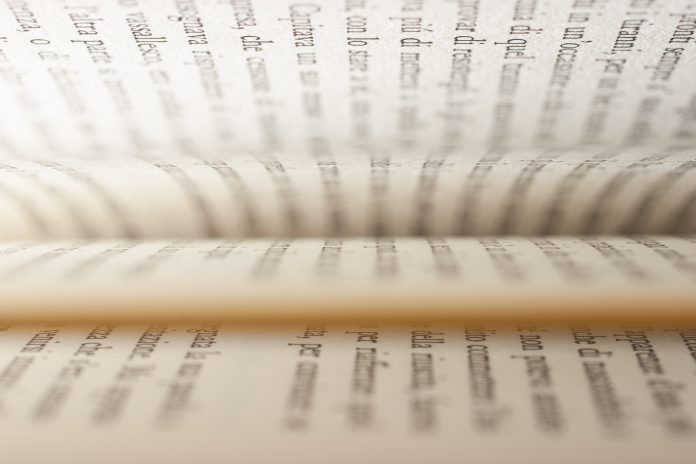 Reading a book.