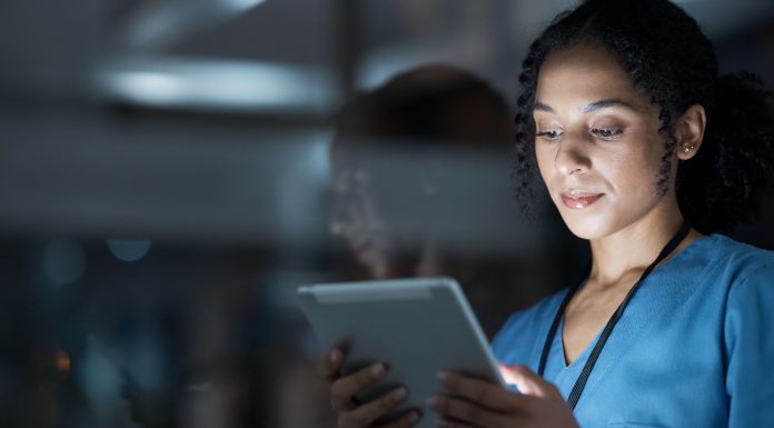 Medical, research and night with doctor and tablet for planning, medicine and schedule. Technology, review and digital with black woman reading report for healthcare, science and life insurance news