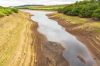 Leighton Reservoir in Nidderdale, North Yorkshire, UK, with very low water levels following a prolonged heatwave and no rainfall.