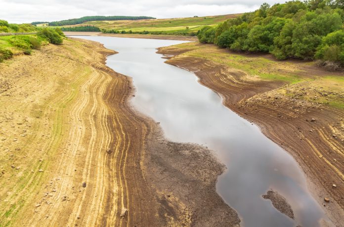 Leighton Reservoir in Nidderdale, North Yorkshire, UK, with very low water levels following a prolonged heatwave and no rainfall.
