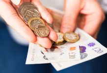 Showing UK coins and notes