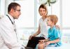 Mother and child in doctor's office stock photo