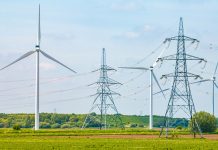 Electric high voltage tower with electric line near Keadby Power Station, England, UK