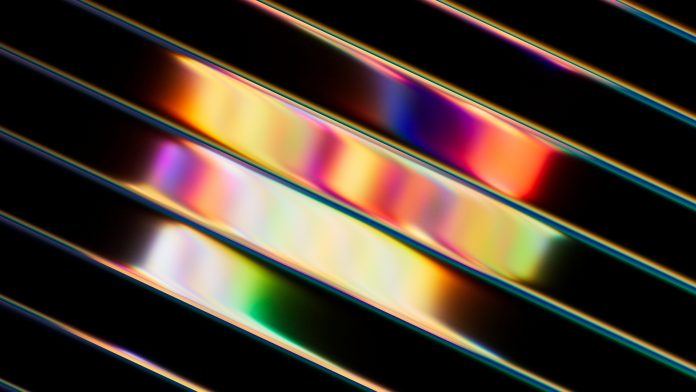 3d render, abstract background of diagonal glossy stripes. Vibrant wallpaper in neon multicolored rainbow shades - laser