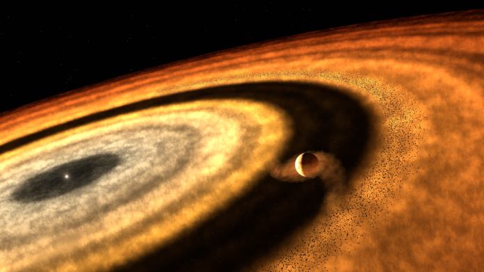 MPIA-PM-WASP-121b-2025_Teaser This artistic impression depicts the stage at which WASP-121b accumulated most of its gas, as inferred from the latest results. The illustration suggests that the forming planet had cleared its distant orbit of solid pebbles, which stored water as ice. As a result, the gap prevented additional pebbles from reaching the planet. WASP-121b must have subsequently migrated from the cold, outer regions towards the inner disc, where it now orbits near its star. Credit: T. Müller (MPIA/HdA)