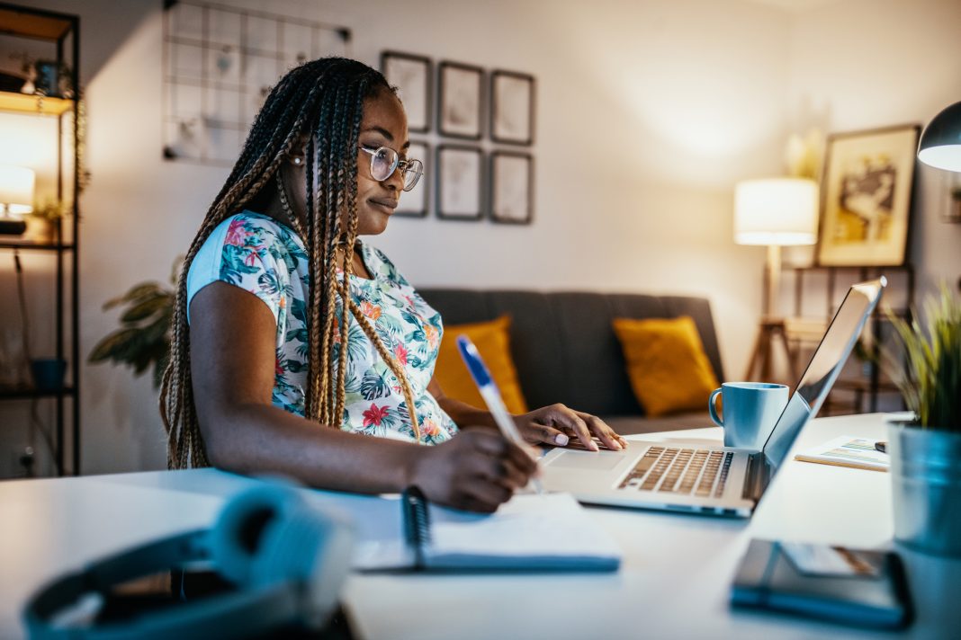 African American female student studying from home during lockdown