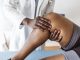 Doctor consulting with patient Knee problems Physical therapy concept