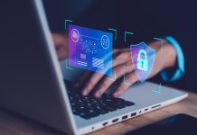 Cyber security and cybercrime. System hacked with Master key lock on laptop, notebook. Cyber attack on computer network, Virus, Spyware, Malware or Malicious software.