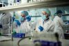 Team of scientists working on a research in laboratory.