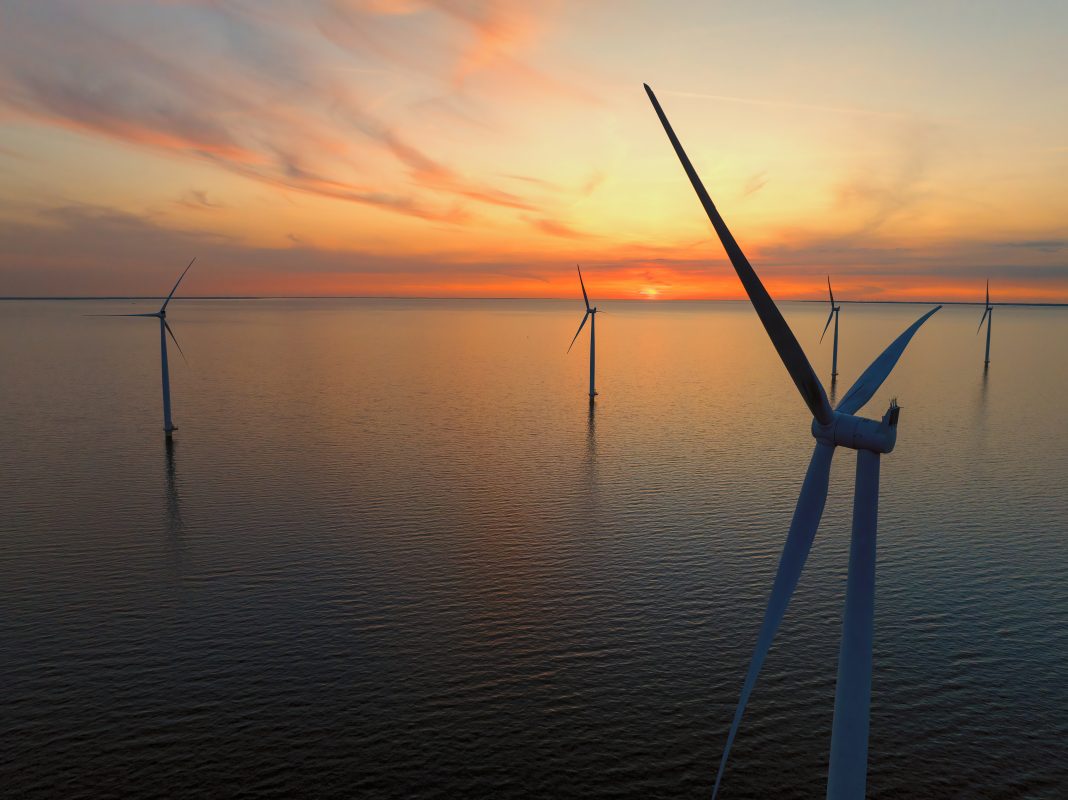 Wind turbines in the Noordoostpolder in Flevoland, The Netherlands, during springtime seen from above.