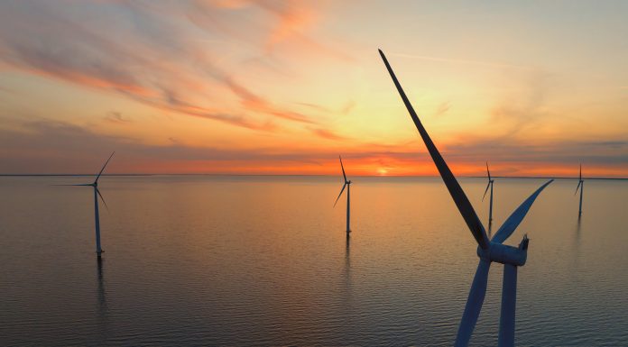 Wind turbines in the Noordoostpolder in Flevoland, The Netherlands, during springtime seen from above.