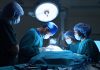 group of veterinarian surgery in operation room take with art lighting and blue filter