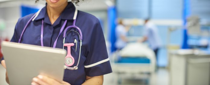 nurse close-up with tablet