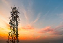5G Sunset Cell Tower: Cellular communications tower for mobile phone and video data transmission