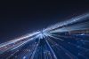Speed lines trail from night city- lens effect. technology background