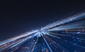 Speed lines trail from night city- lens effect. technology background
