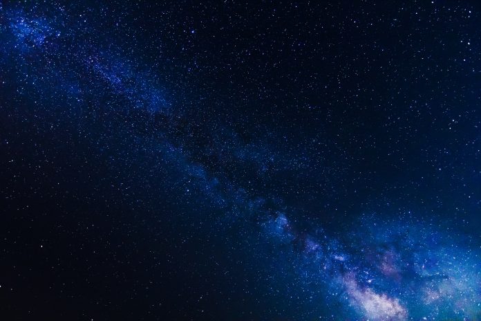 Stars and Milky Way Galaxy on clear dark night sky
