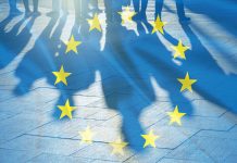 EU Flag and shadows of People concept picture