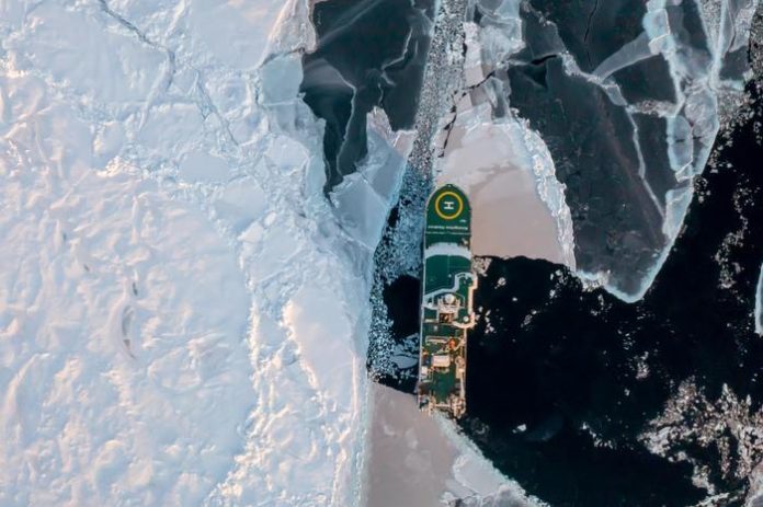 RV Kronprins Haakon sailing through Arctic sea ice. Image Credit Dimitri Kalenitchenko/UiT