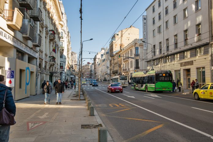 Boulevard Regina Elisabeta in sunny weather. Bucharest, Romania.
