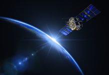 Satellite And Sunrise In Space