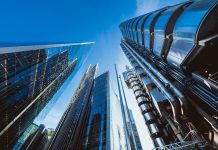 Looking directly up at the skyline of the financial district in central London