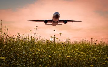 Ecoconscious travel promotes sustainable aviation fuel to reduce carbon footprint - 3D illustration