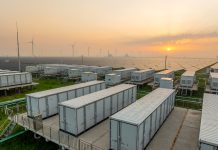 Energy storage power station, solar power station and wind power station at sunrise