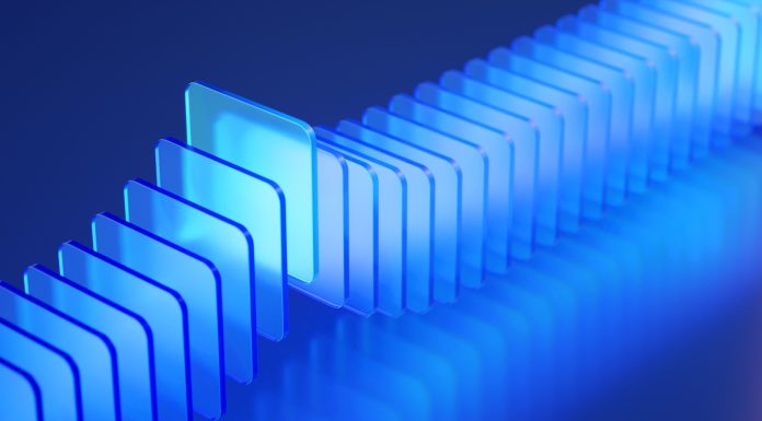 Brightly illuminated transparent blue acrylic panels are showcased in a modern and clean composition, emphasizing design and innovation.