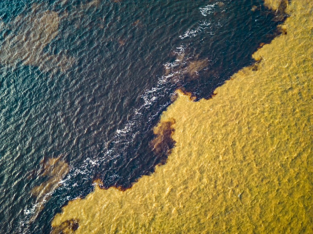 Amazing view of two rivers Negro and Amazon meeting in Manaus Brazil from above