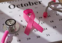 Breast cancer awareness month: New EU4Health projects boost awareness and data integration A pink ribbon symbolizing breast cancer awareness placed on an October calendar alongside a stethoscope highlighting healthcare and awareness