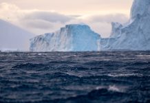 Huge icebergs and mountains in Antarctica. Snow and ice. Antarctica landscape. Glaciers.