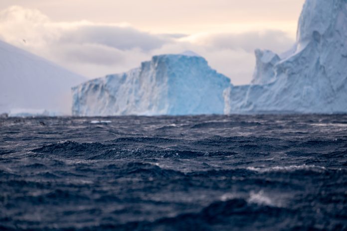 Huge icebergs and mountains in Antarctica. Snow and ice. Antarctica landscape. Glaciers.