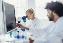 Diverse Lab Colleagues Analyzing Samples
