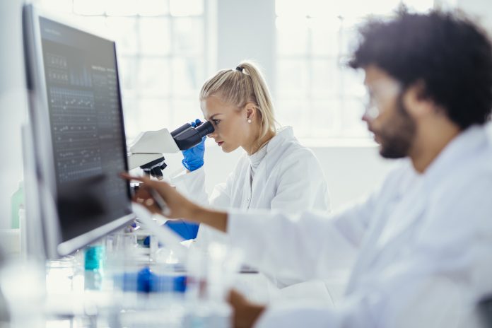Diverse Lab Colleagues Analyzing Samples