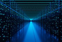 Server racks full of routers, switches and servers aligning on both sides of an aisle of a data center. Illustration of the concept of cloud computing and infrastructure as a service (IaaS)