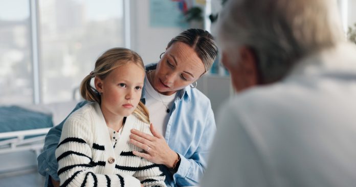 Woman, doctor and child in clinic for medical services, consultation or opinion. People, girl and pediatric patient in conversation for appointment, checkup and healthcare with treatment advice