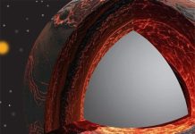 The illustration shows a cutaway revealing the interior of early Earth with a hot, melted layer above the boundary between the core and mantle. Scientists think some material from the core leaked into this molten layer and mixed in. Over time, that mixing helped create the uneven structure of Earth’s mantle that we see today. Credit Illustration by Yoshinori Miyazaki/Rutgers University