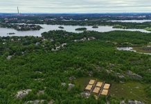 Sudbury peatland restoration from metal pollution The location of the experimental restoration peatland (with the six treatment plots covered in straw mulch) is set against the Sudbury landscape, with the now decommissioned 381m tall ‘Superstack’ in the background. The site is located within the Laurentian University Greenspace and emphasizes the importance of this research and education opportunity for both local and global audiences.