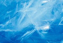 blue frozen texture of ice with copy-space