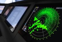 Radar screen with green display indication on a captains bridge