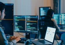 Group Adult Asia male, female freelance typing write prompt AI bot IT app smart program nomad, video game, terminal with coding language, designer, big data center on computer in night office.