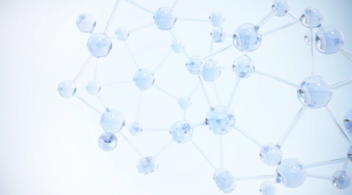 A close-up view of glowing molecular structures under a blue background representing scientific research and chemistry concepts