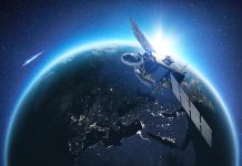 Amazing beautiful blue planet earth with satellite at sunset view from space. Horizon Earth with the lights of night cities. Communication and Telecommunications. Broadcasting.