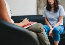 Better workplace mental health Psychotherapy session, woman talking to his psychologist in the studio