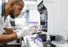 First volunteer receives Lassa fever vaccine in University of Oxford trial Scientist working in the laboratory