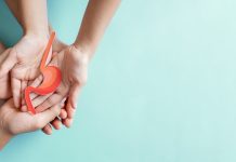 Hands holding stomach, heartburn, Gastroesophageal reflux disease (GERD) or acid reflux symptom, health care concept