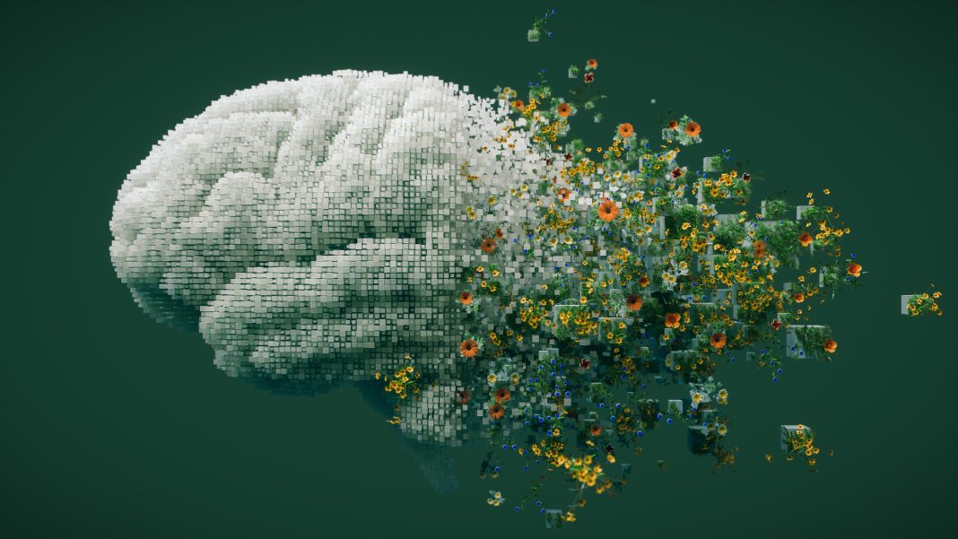 3D illustration of a human brain constructed from digital cubes dissolving into natural elements like flowers and greenery, symbolizing the fusion of technology and nature on a dark green background.