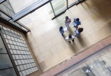 New Respiratory Therapy Solutions framework helps patients stay well at home this winter Group of doctors talking in a casual meeting at the hospital